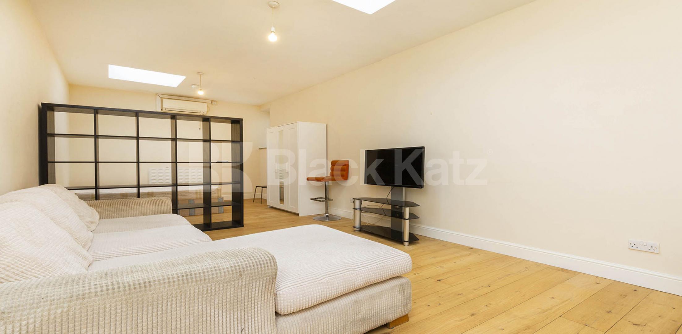 Large studio flat located within a gated development High Street , Hornsey 